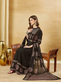 Woman wearing a black floral pure cotton anarkali suit with dupatta