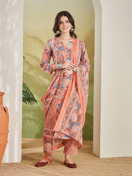 Woman in coral floral printed kurta set with matching dupatta, ethnic wear for women