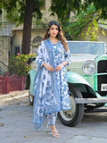 Woman wearing a blue and white floral printed Indian ethnic salwar kameez set with dupatta.