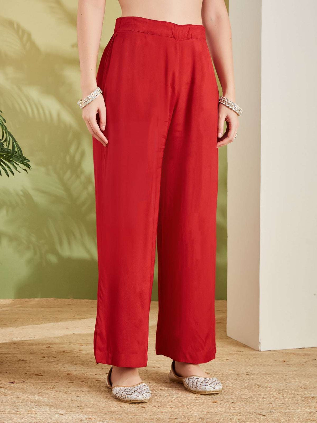 Women's elegant red wide-leg silk trousers for Indian ethnic wear.
