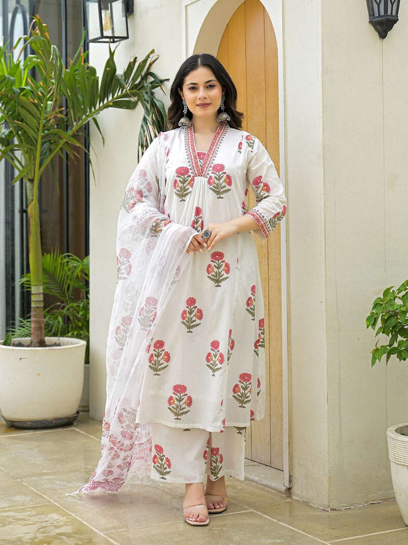 Woman in white floral print Indian ethnic kurta set with dupatta