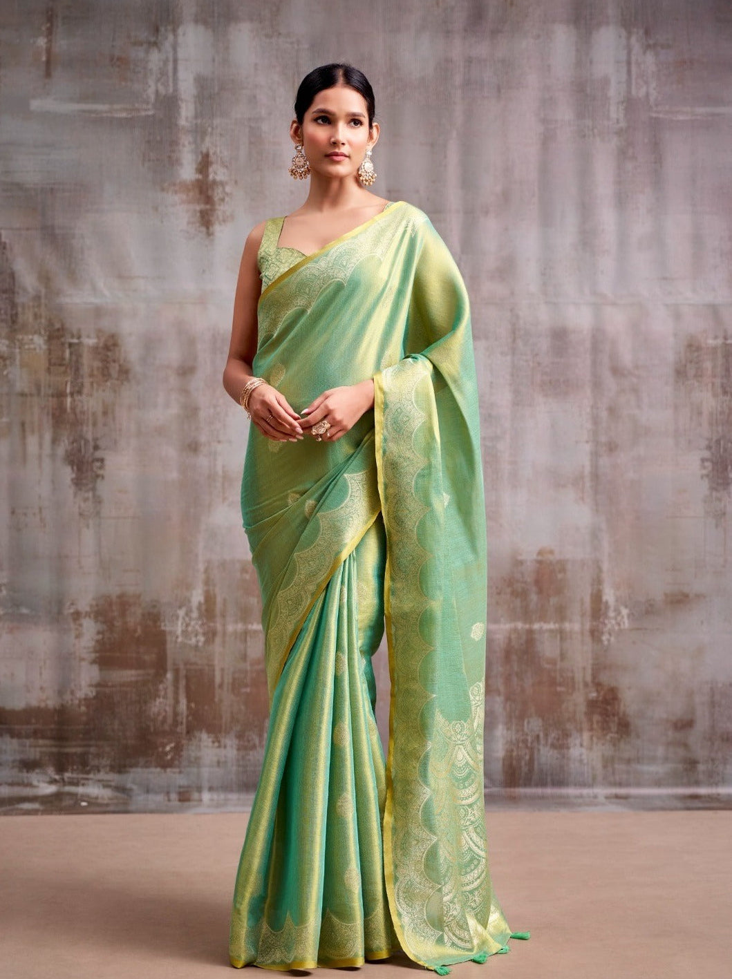 Luminous Grace: Designer Tissue Silk Saree with Matching Blouse Piece