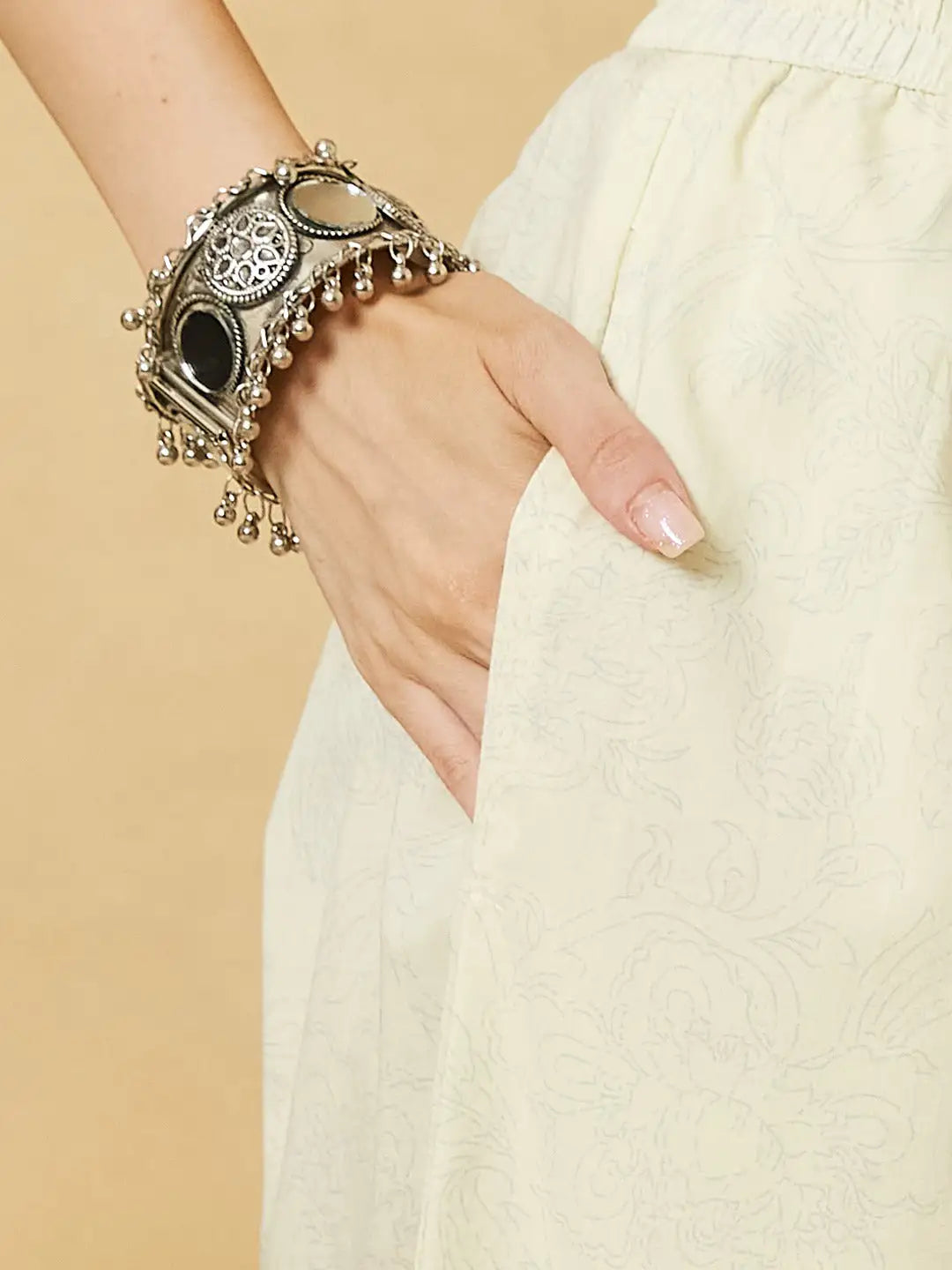 Oxidized silver tribal style cuff bracelet with mirror work and hanging beads