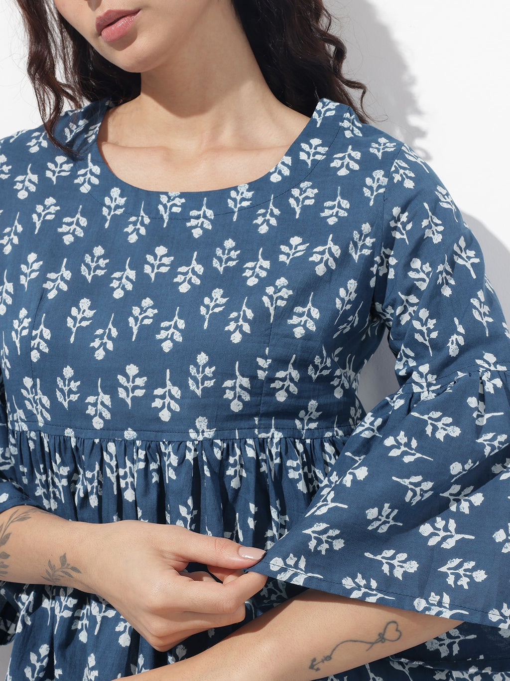 Blue Floral Round Neck Peplum Top