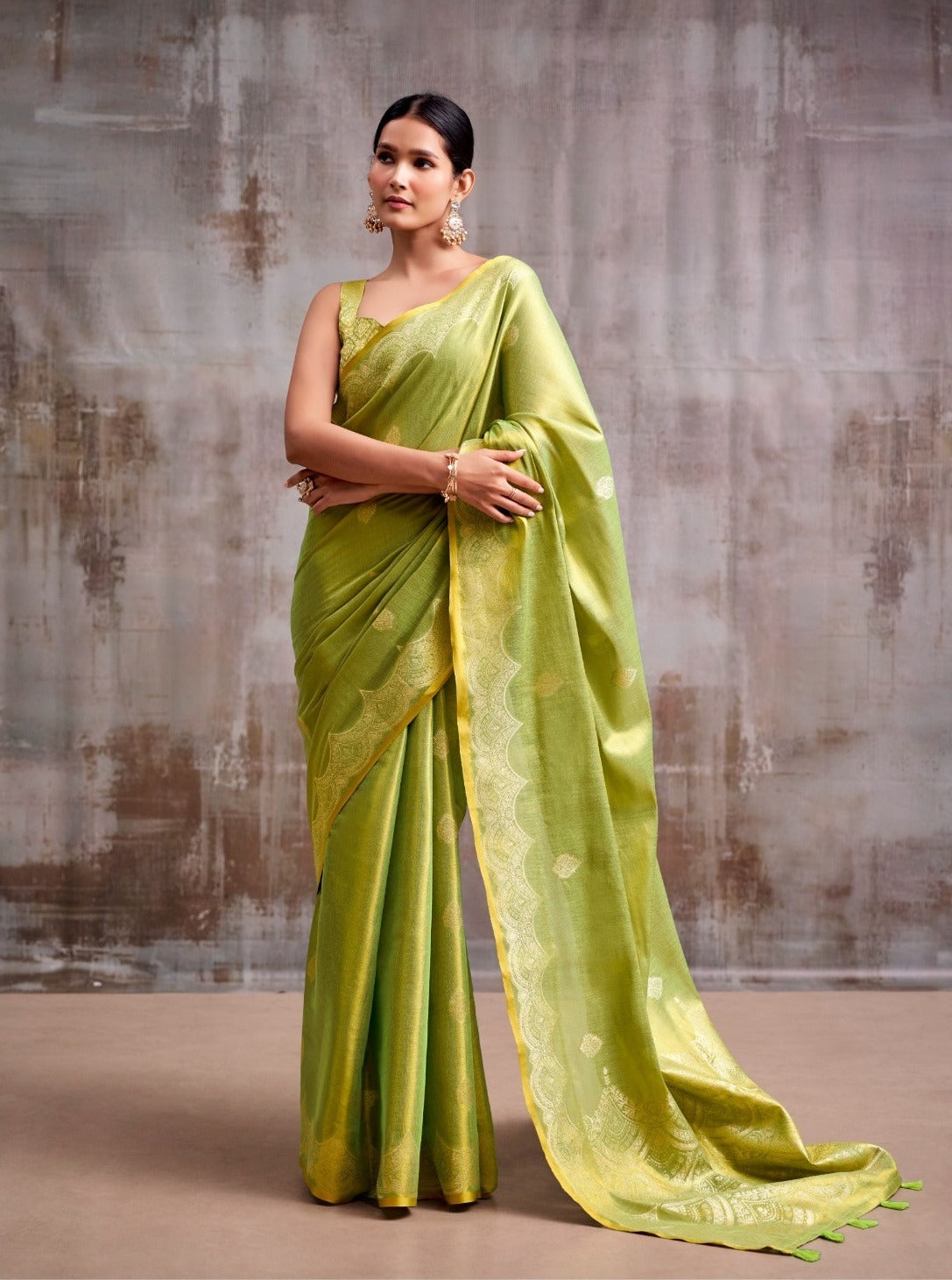 Luminous Grace: Designer Tissue Silk Saree with Matching Blouse Piece