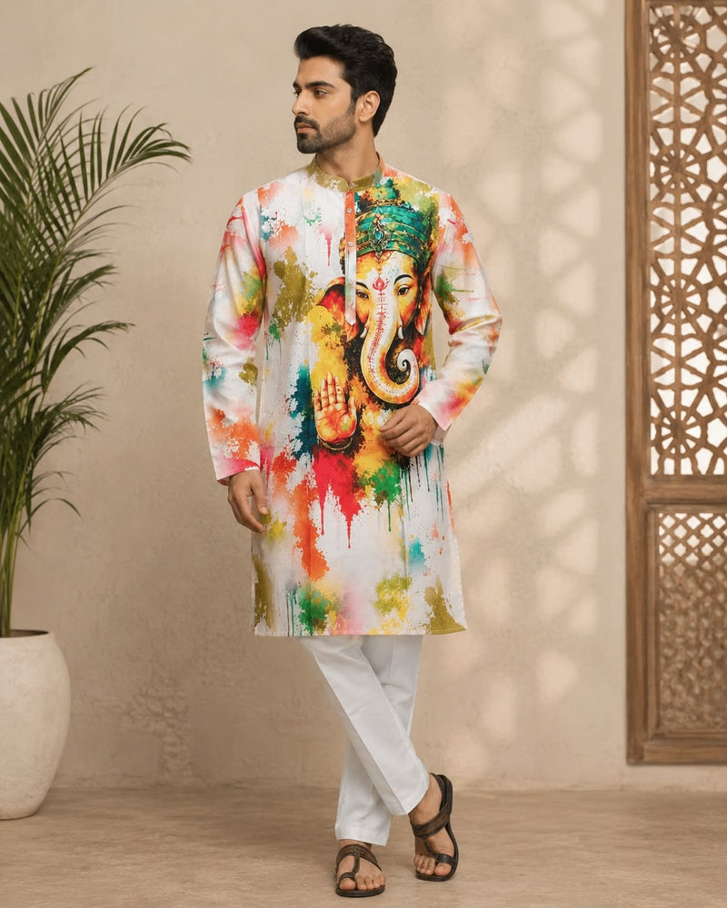 Man wearing a white Indian kurta with a colorful Lord Ganesha print and white trousers.